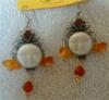 amber and bone face earrings